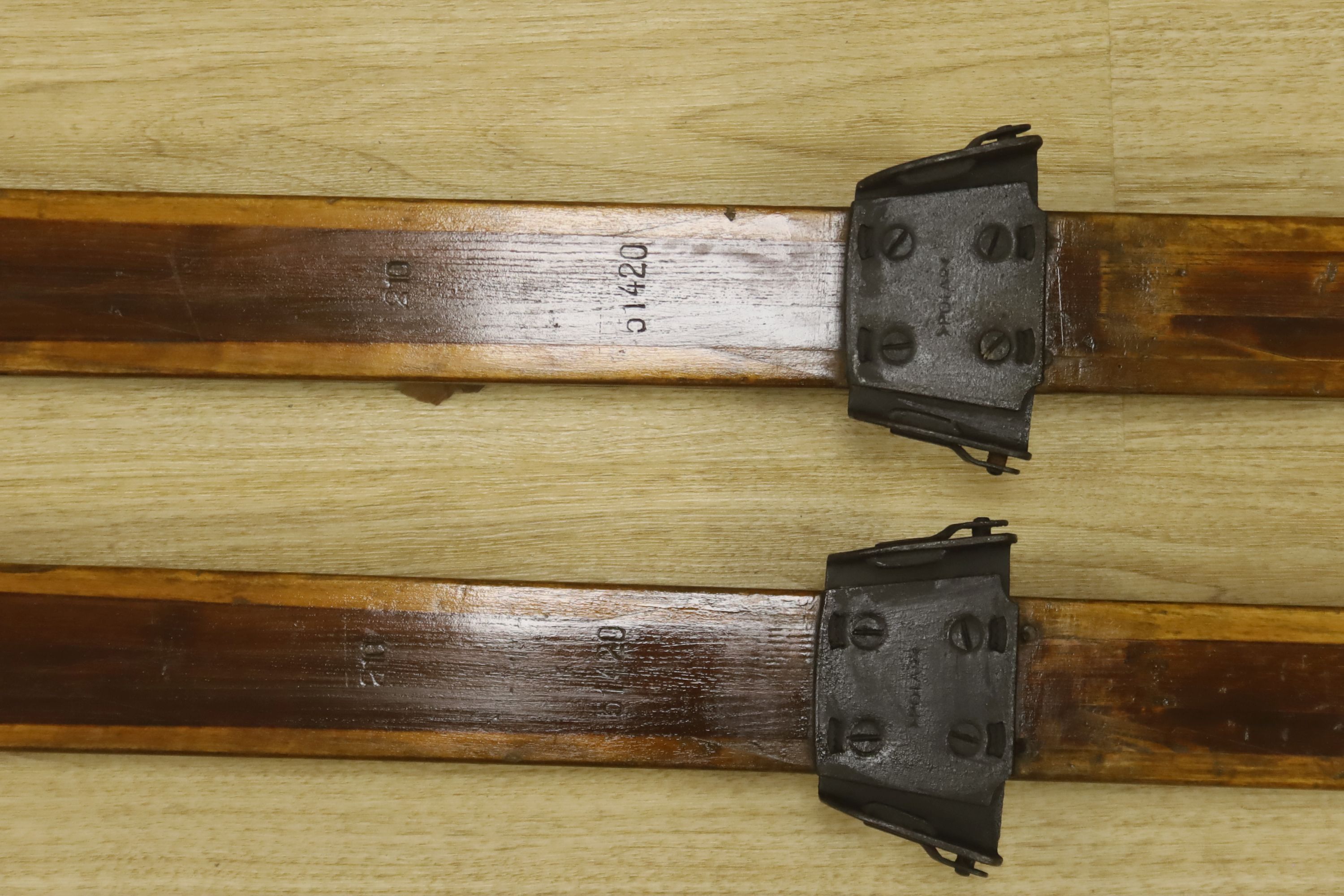 A pair of vintage wood skis, length 210cm